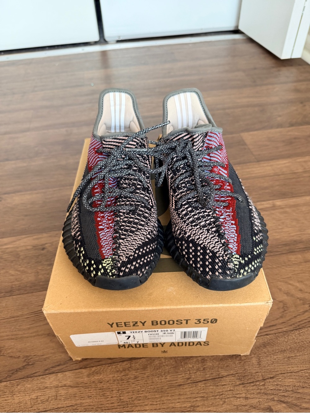 adidas Women's Multicolor Knit Sneaker with Red Accents